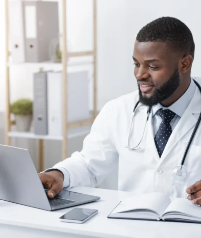 friendly-black-doctor-making-online-check-up-usin-2025-03-31-23-56-39-utc (1) (1)
