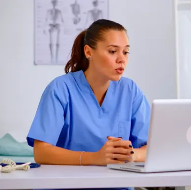 Healthcare professional consulting a patient via video call